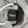 Dettaglio etichetta interna PYREX nel collo della felpa