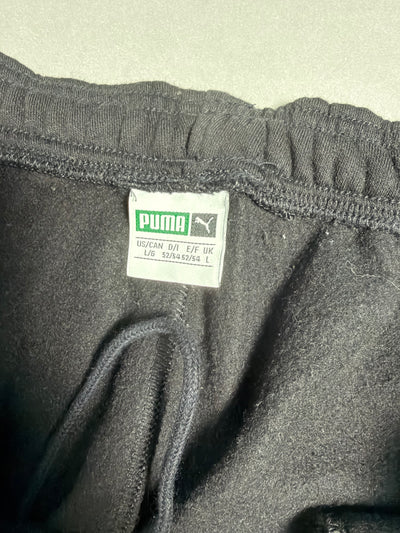 Etichetta Puma con taglia L all'interno della vita dei pantaloni