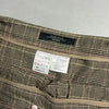 Etichetta interna con logo Weekend Max Mara, composizione 60% lana vergine e taglia IT 42