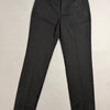 Pantaloni neri eleganti Zara Woman distesi su superficie neutra
