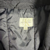 Etichetta interna del colletto Calvin Klein Jeans con taglia XL
