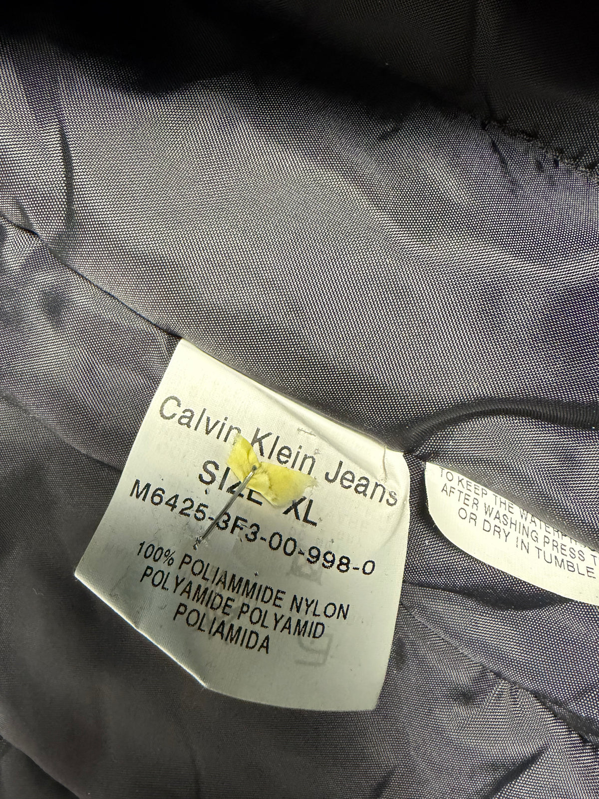 Etichetta interna di composizione 100% poliammide nylon taglia XL