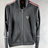 Vista frontale della felpa con zip GUESS nera con logo a triangolo sul petto