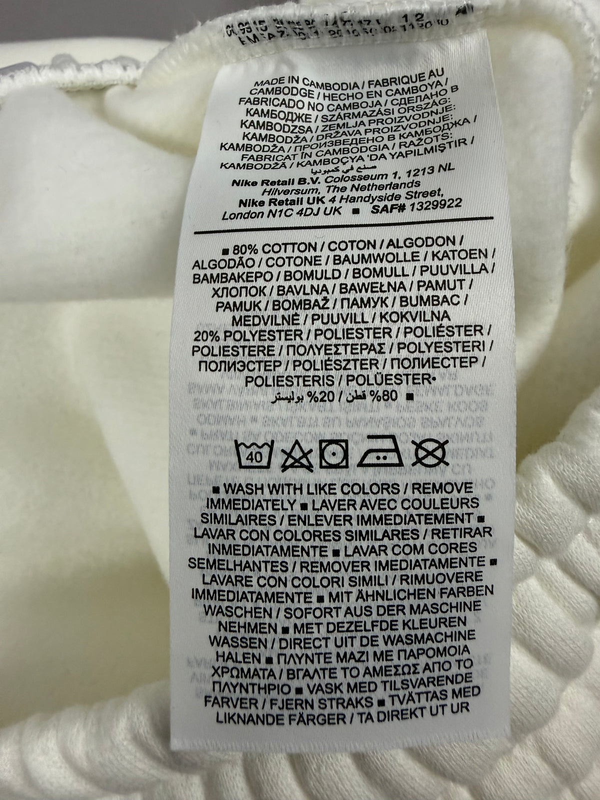 Etichetta composizione Nike con 80% cotone e 20% poliestere