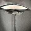 Etichetta Zara Woman con taglia L all’interno del vestito nero