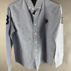 Vista frontale camicia azzurra U.S. Polo Assn. con colletto button-down e logo ricamato