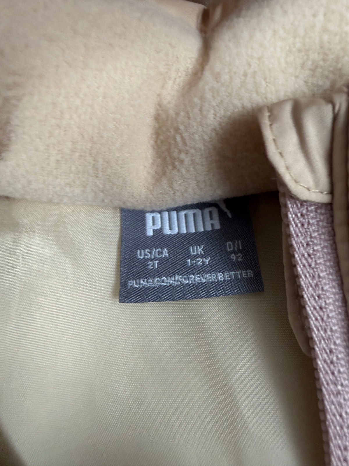 Etichetta interna Puma con taglia US/CA 2T, UK 1-2Y, D/H 92
