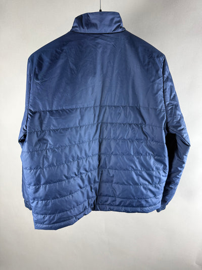 Retro della giacca imbottita blu con trapuntatura e collo alto