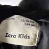Etichetta Zara Kids con taglia 13/14 anni e 164 cm
