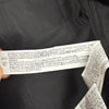 Etichetta di composizione Zara con materiali e dettagli produttore